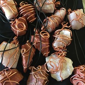 Crystal wrapped necklaces